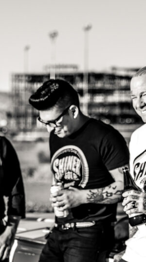 A group of men standing next to each other.