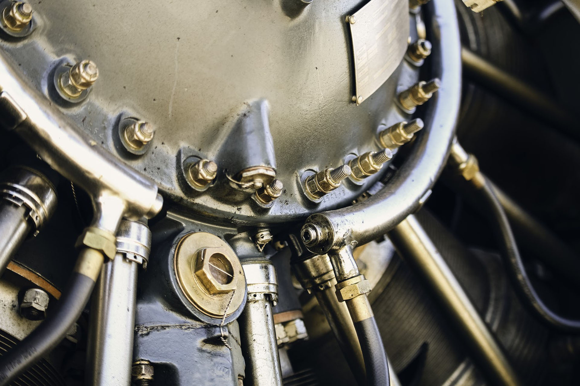 A close up of the valves on an airplane engine.
